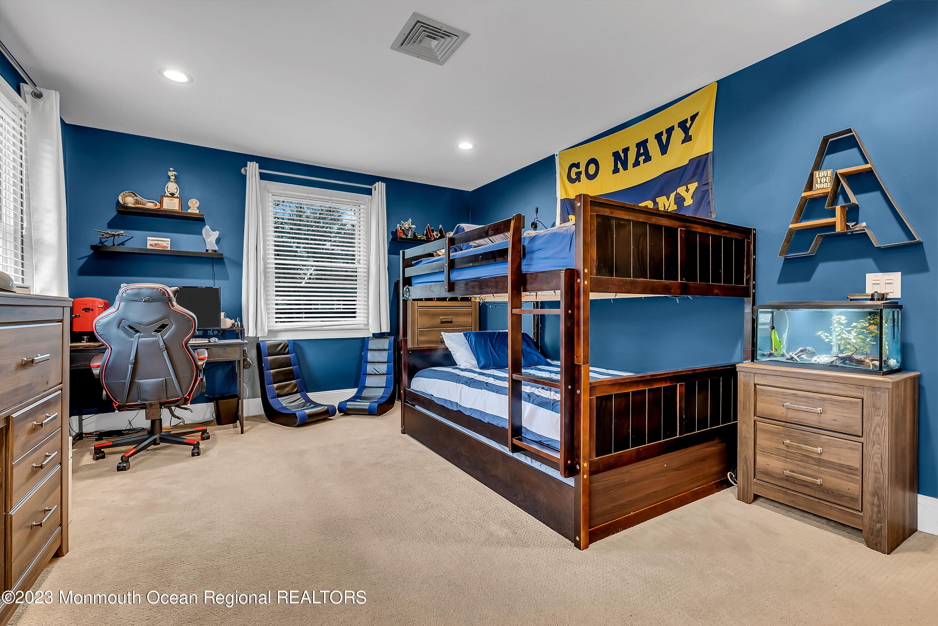 515 Monmouth Road West Allenhurst, NJ 07711 - Photo 15 of 45 a bedroom with furniture and a window