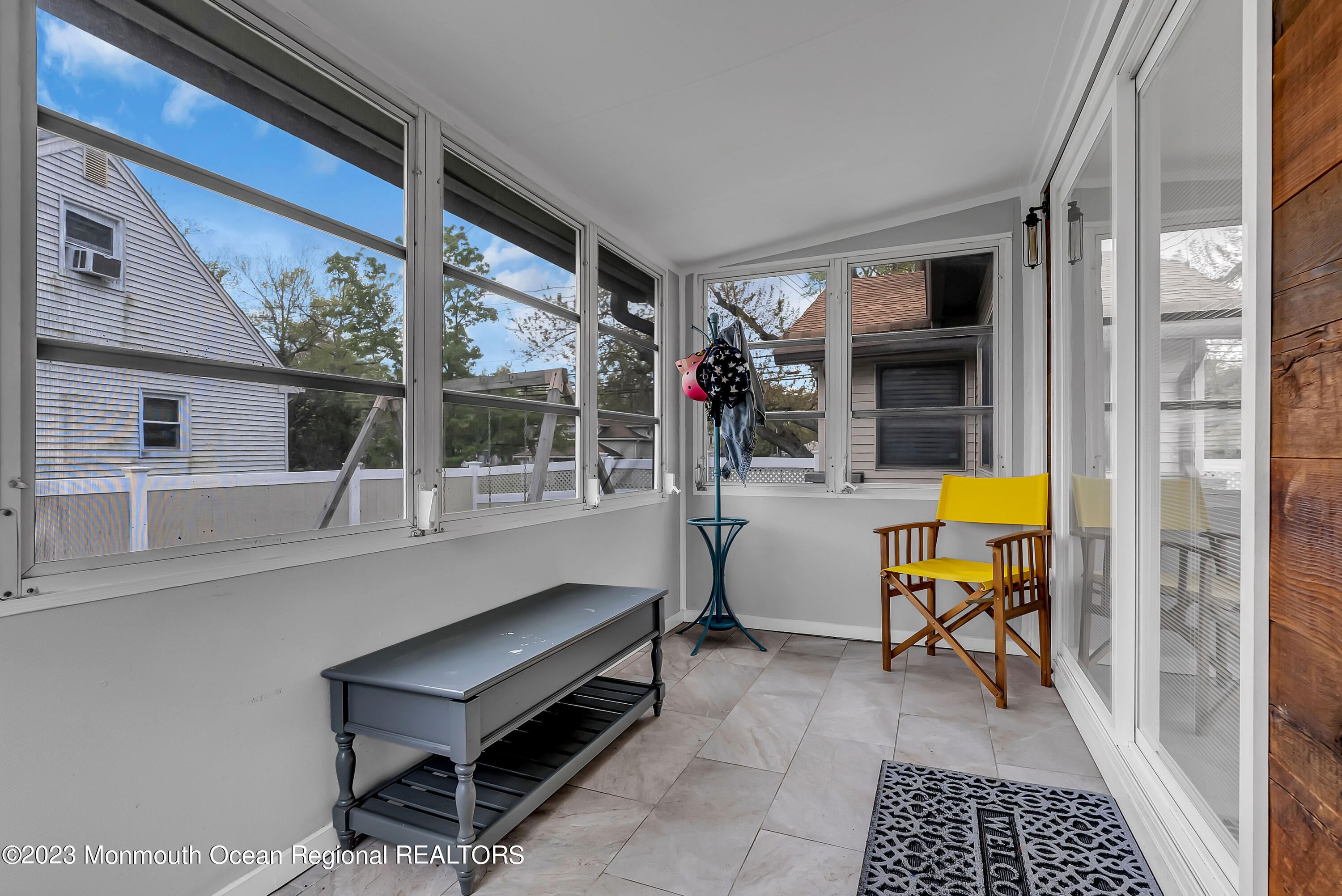 515 Monmouth Road West Allenhurst, NJ 07711 - Photo 17 of 45 a backyard of a house with barbeque oven table and chairs