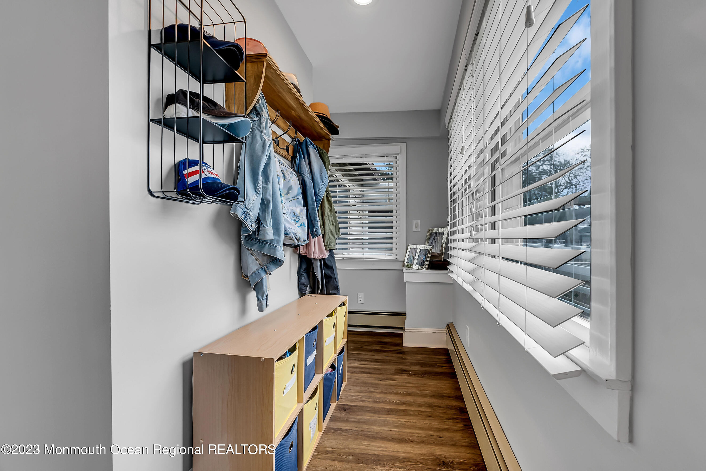 515 Monmouth Road West Allenhurst, NJ 07711 - Photo 18 of 45 a view of walk in closet with clothes and shoes