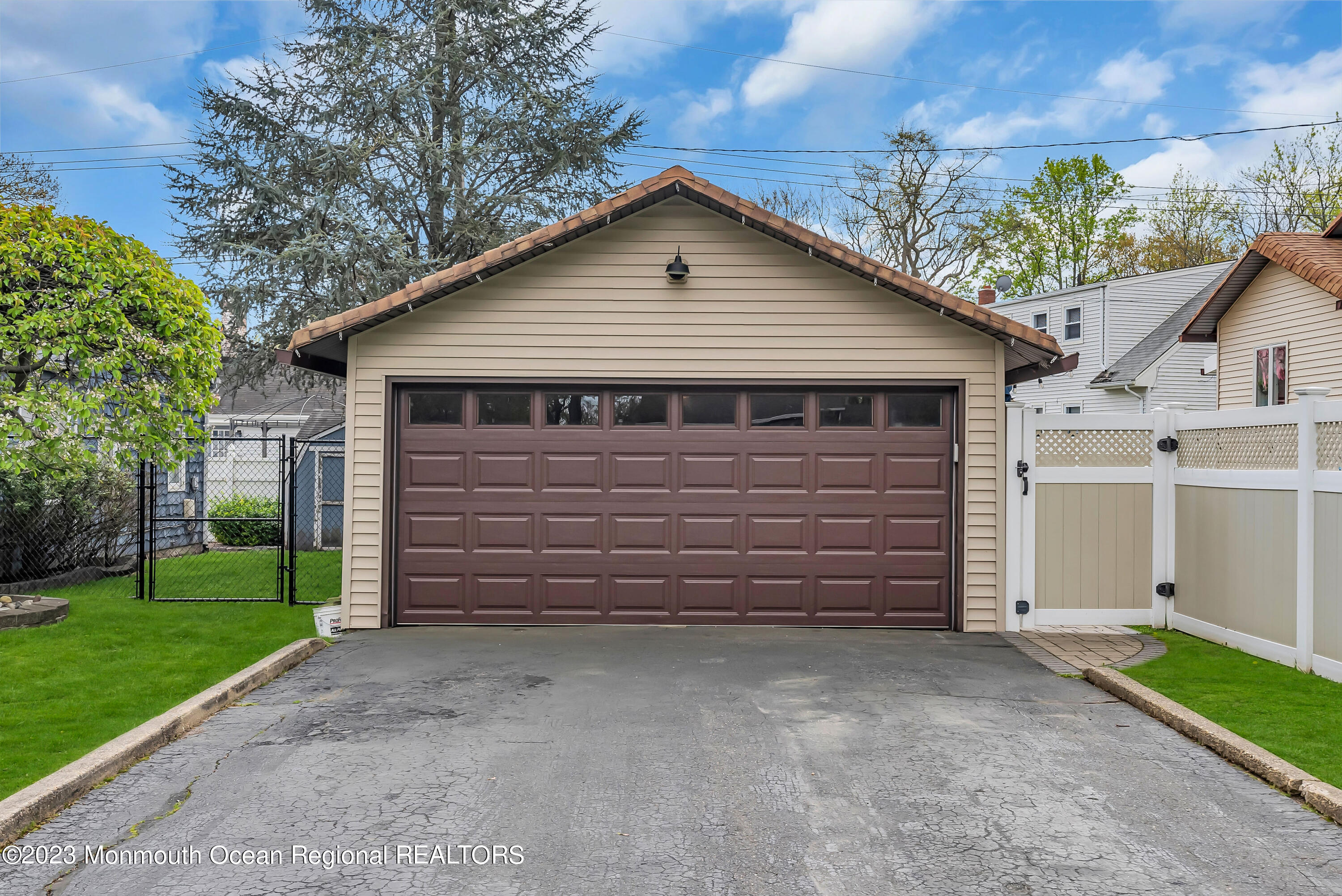 515 Monmouth Road West Allenhurst, NJ 07711 - Photo 26 of 45 a view of a house and a yard