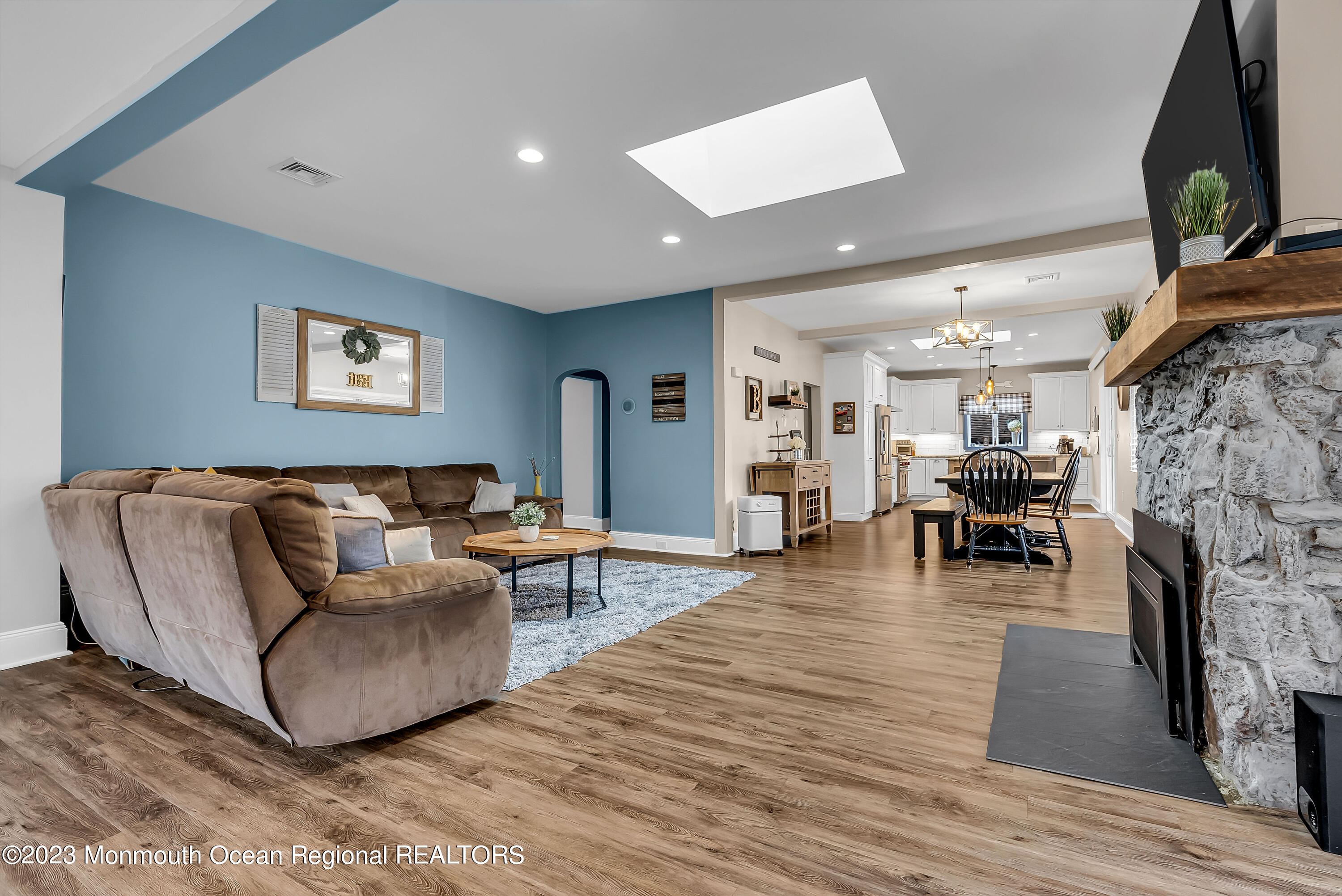 515 Monmouth Road West Allenhurst, NJ 07711 - Photo 37 of 45 a living room with furniture and a fireplace