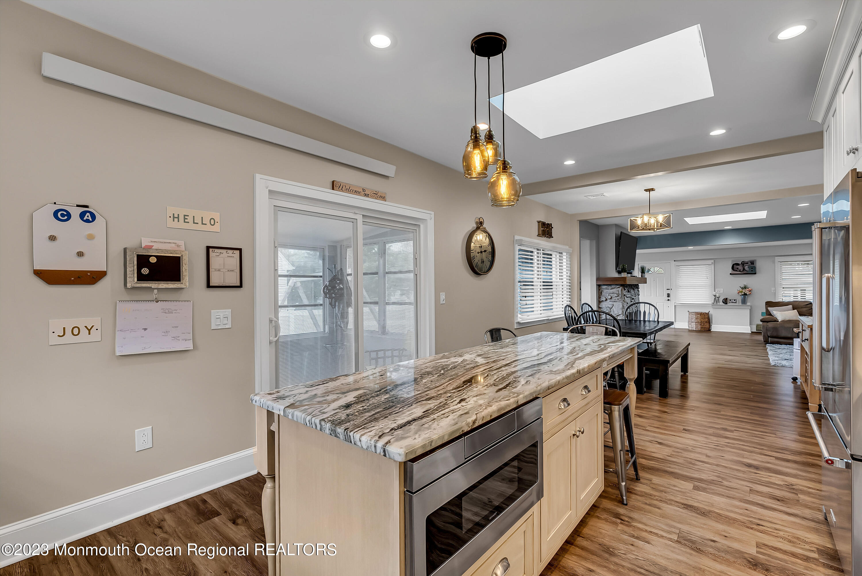 515 Monmouth Road West Allenhurst, NJ 07711 - Photo 42 of 45 a kitchen with stainless steel appliances granite countertop a stove and a refrigerator