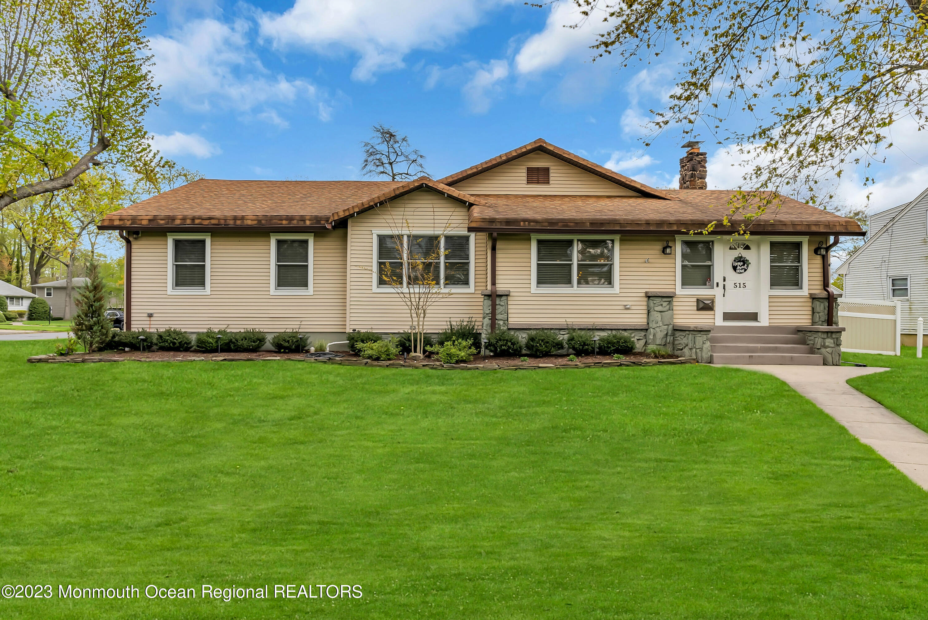 515 Monmouth Road West Allenhurst, NJ 07711 - Photo 45 of 45 a front view of a house with a yard