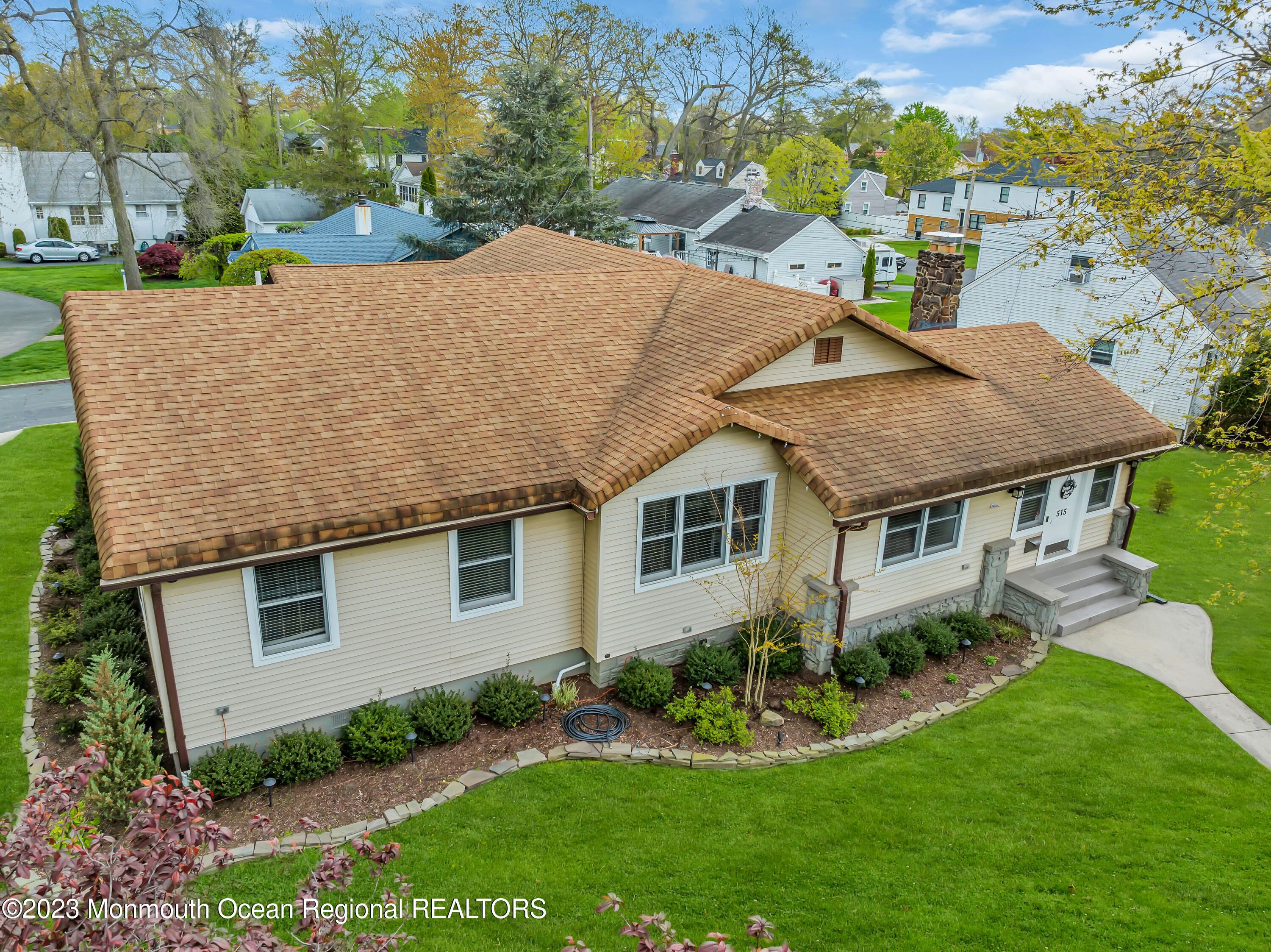 515 Monmouth Road West Allenhurst, NJ 07711 - Photo 6 of 45 a aerial view of a house with a yard and potted plants