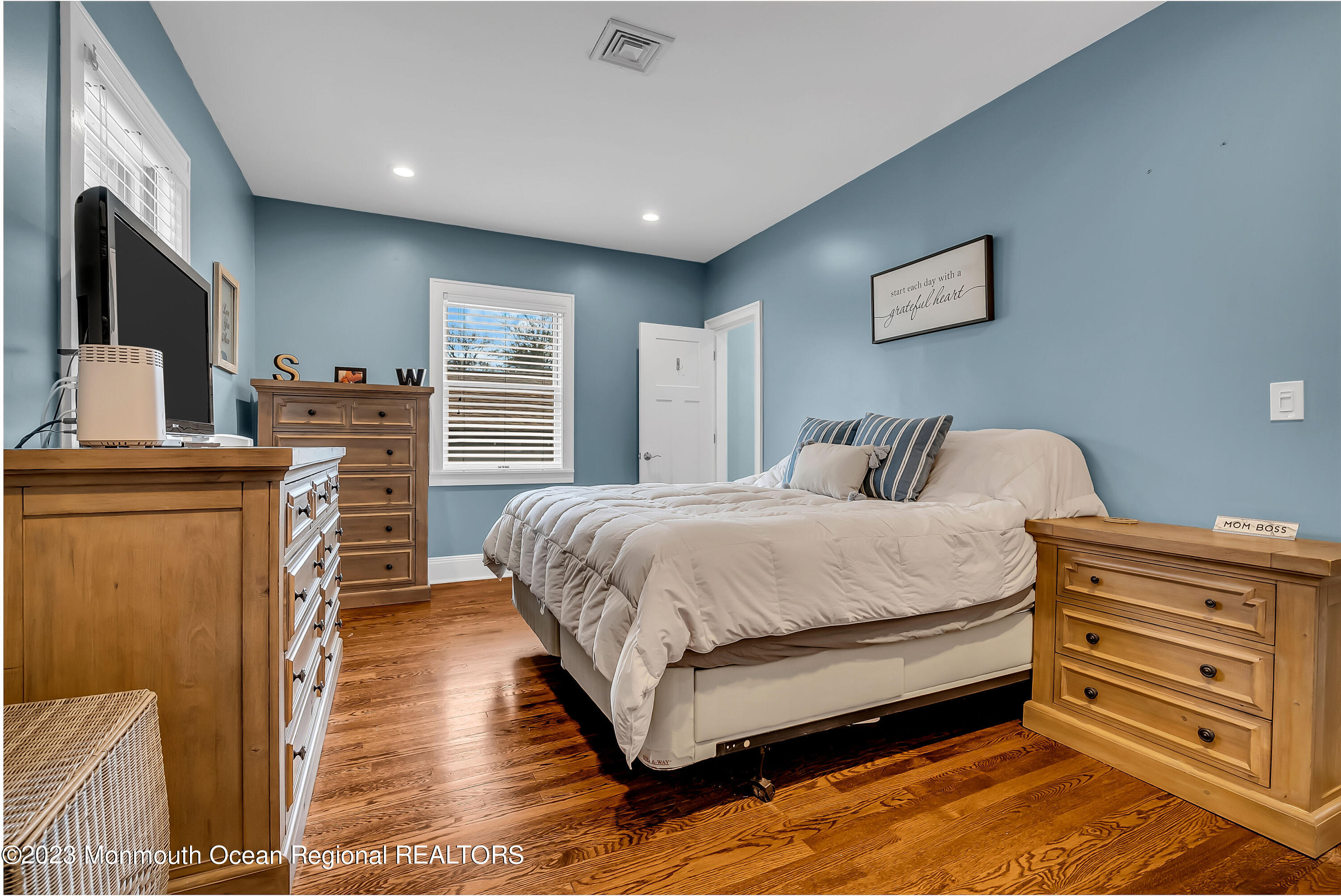515 Monmouth Road West Allenhurst, NJ 07711 - Photo 7 of 45 a bedroom with a bed and furniture