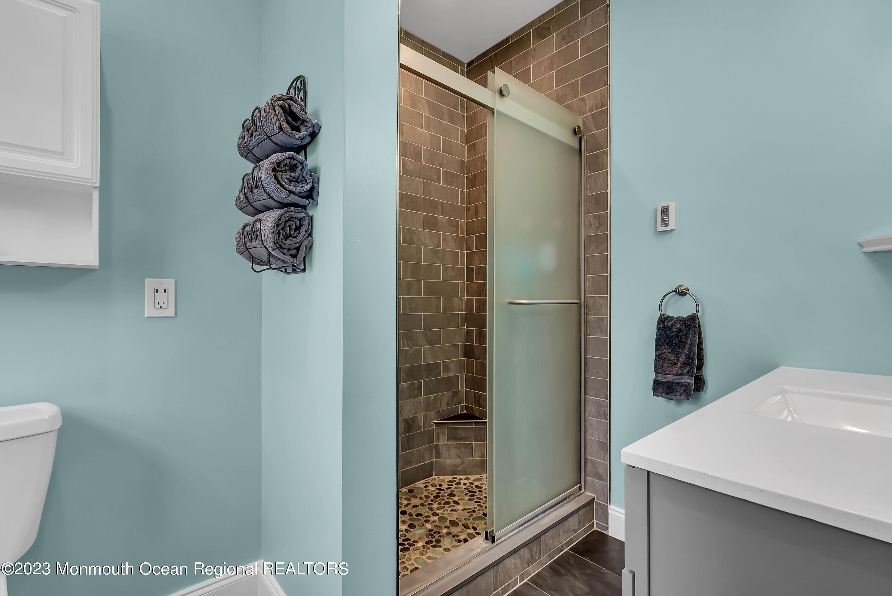 515 Monmouth Road West Allenhurst, NJ 07711 - Photo 9 of 45 a bathroom with a shower and toilet