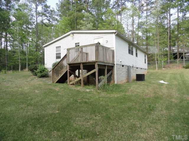 1787 Government Road Clayton, NC 27520 - Photo 11 of 11 Rear view and side deck