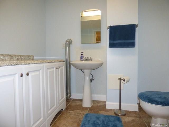 9085 Evergreen Road Brighton, MI 48116 - Photo 12 of 25 (12)Laundry-Half Bath.jpg