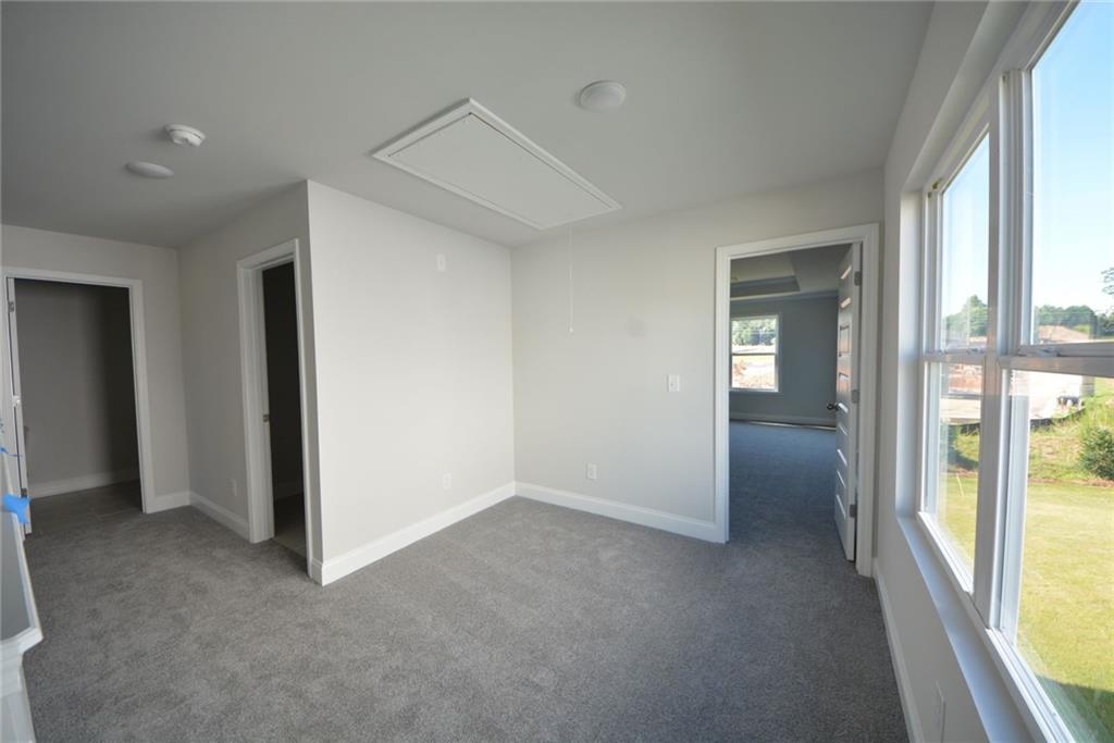 3871 Brookburn Park Gainesville, GA 30506 - Photo 17 of 28 an empty room with windows
