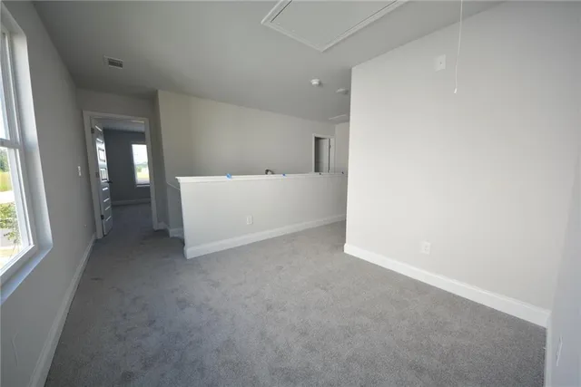 a view of a livingroom with a ceiling fan