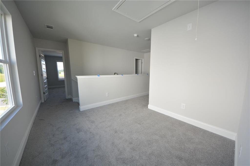 3871 Brookburn Park Gainesville, GA 30506 - Photo 18 of 28 a view of an empty room with a window
