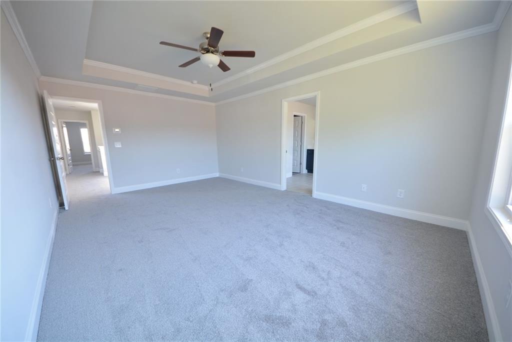 3871 Brookburn Park Gainesville, GA 30506 - Photo 19 of 28 a view of a livingroom with a ceiling fan