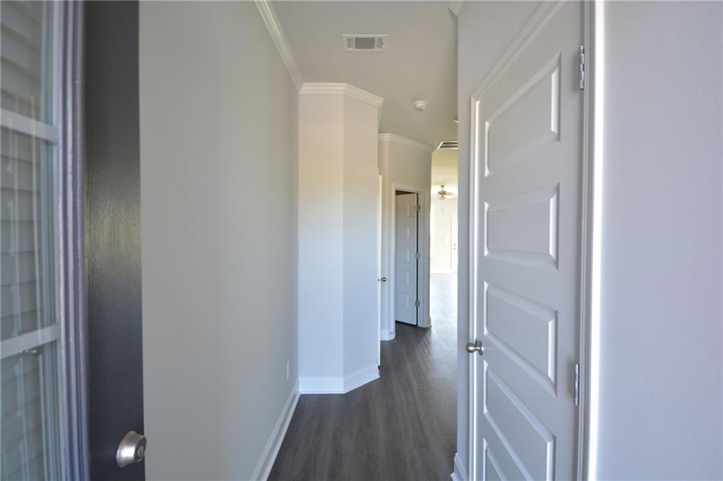 3871 Brookburn Park Gainesville, GA 30506 - Photo 5 of 28 a view of a bathroom from the hallway