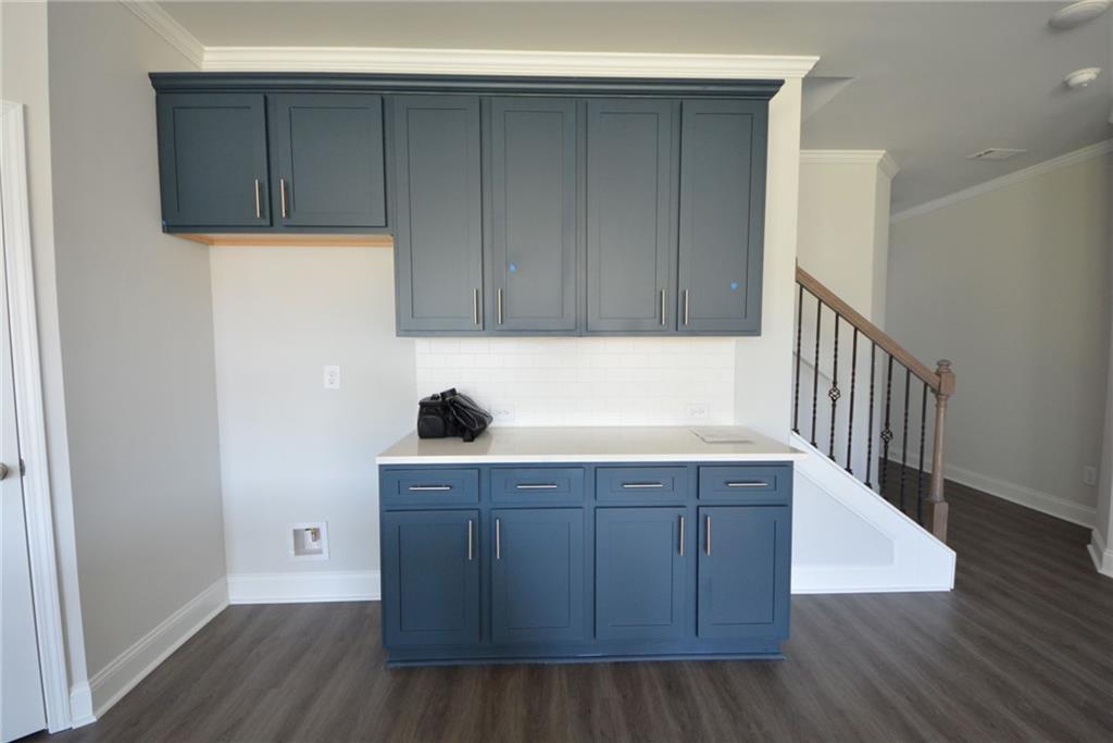 3871 Brookburn Park Gainesville, GA 30506 - Photo 8 of 28 a view of cabinets with wooden floor