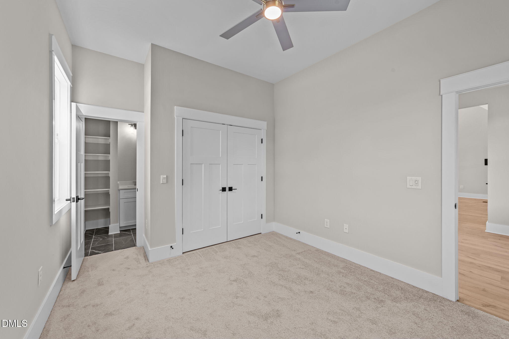 2568 Lassiter Road Four Oaks, NC 27524 - Photo 15 of 50 an empty room with a empty space and a ceiling fan