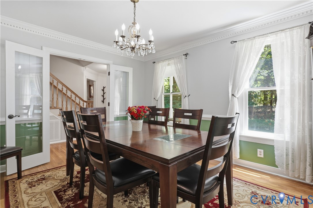 12512 2nd Branch Road Chesterfield, VA 23838 - Photo 18 of 56 a view of a dining room with furniture window and wooden floor