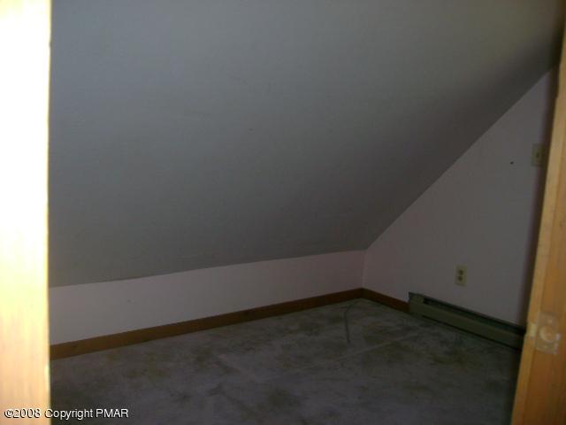 1213 Winchester Way Bushkill, PA 18324 - Photo 7 of 9 Bedroom w/ slanted ceiling