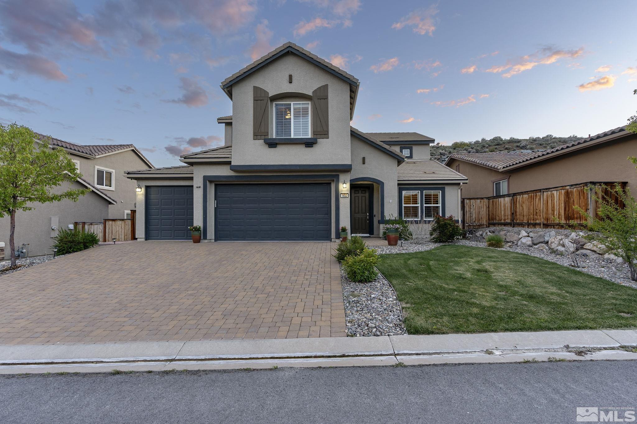 1653 Crescent Pointe Court Reno, NV 89523 - Photo 1 of 39 front view of a house with a yard