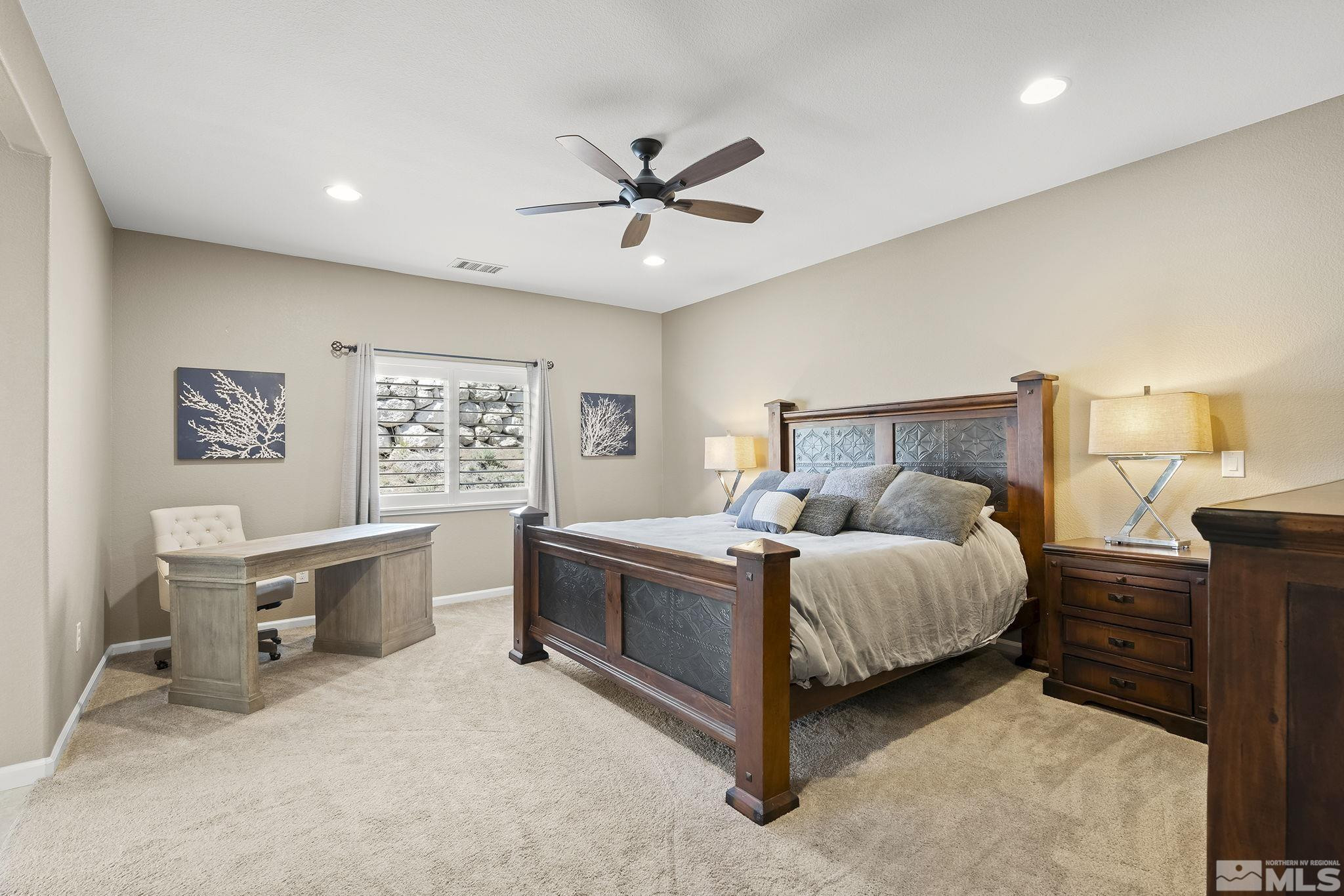 1653 Crescent Pointe Court Reno, NV 89523 - Photo 16 of 39 a bed room with a bed and a window