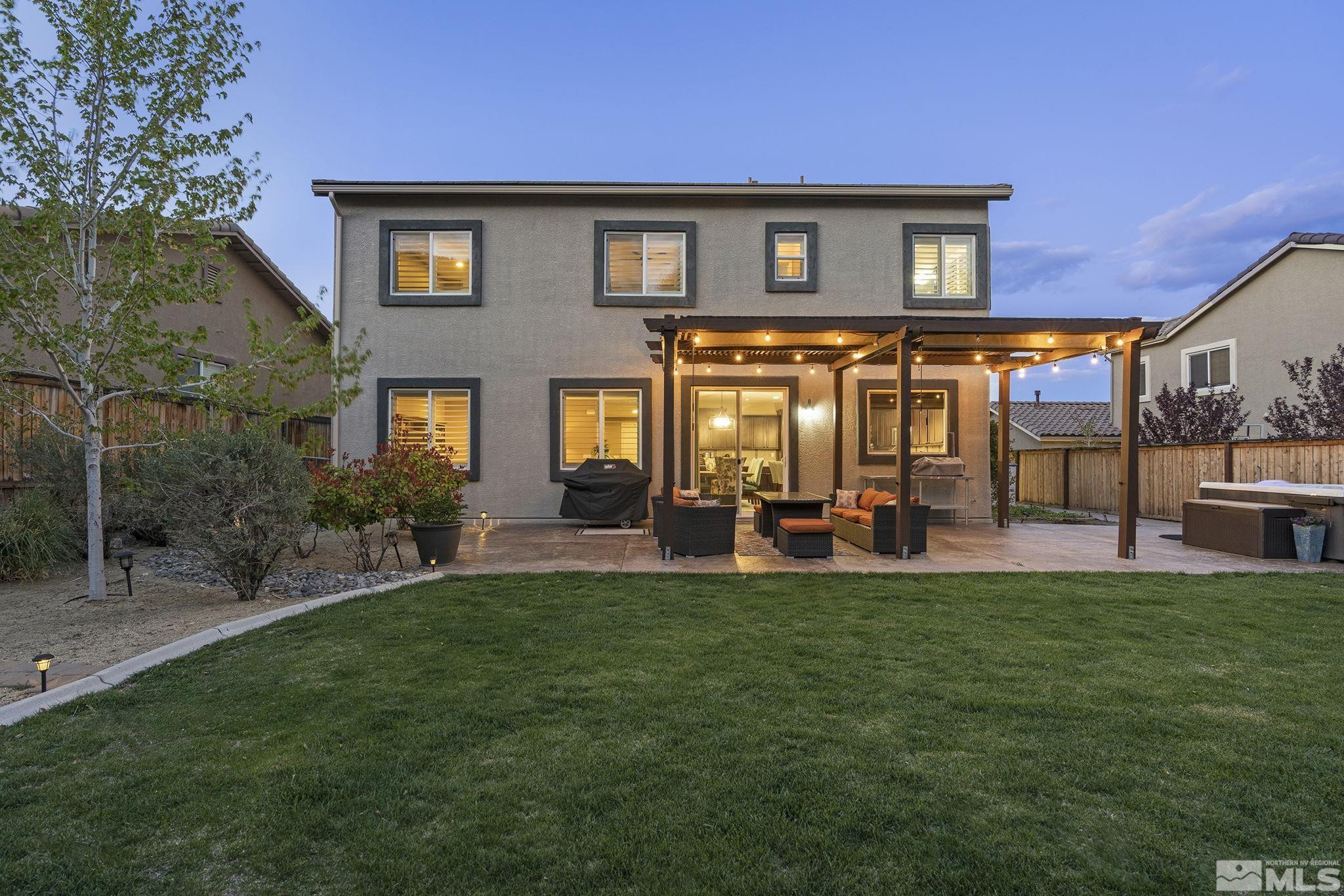 1653 Crescent Pointe Court Reno, NV 89523 - Photo 27 of 39 a view of a house with a yard and sitting area
