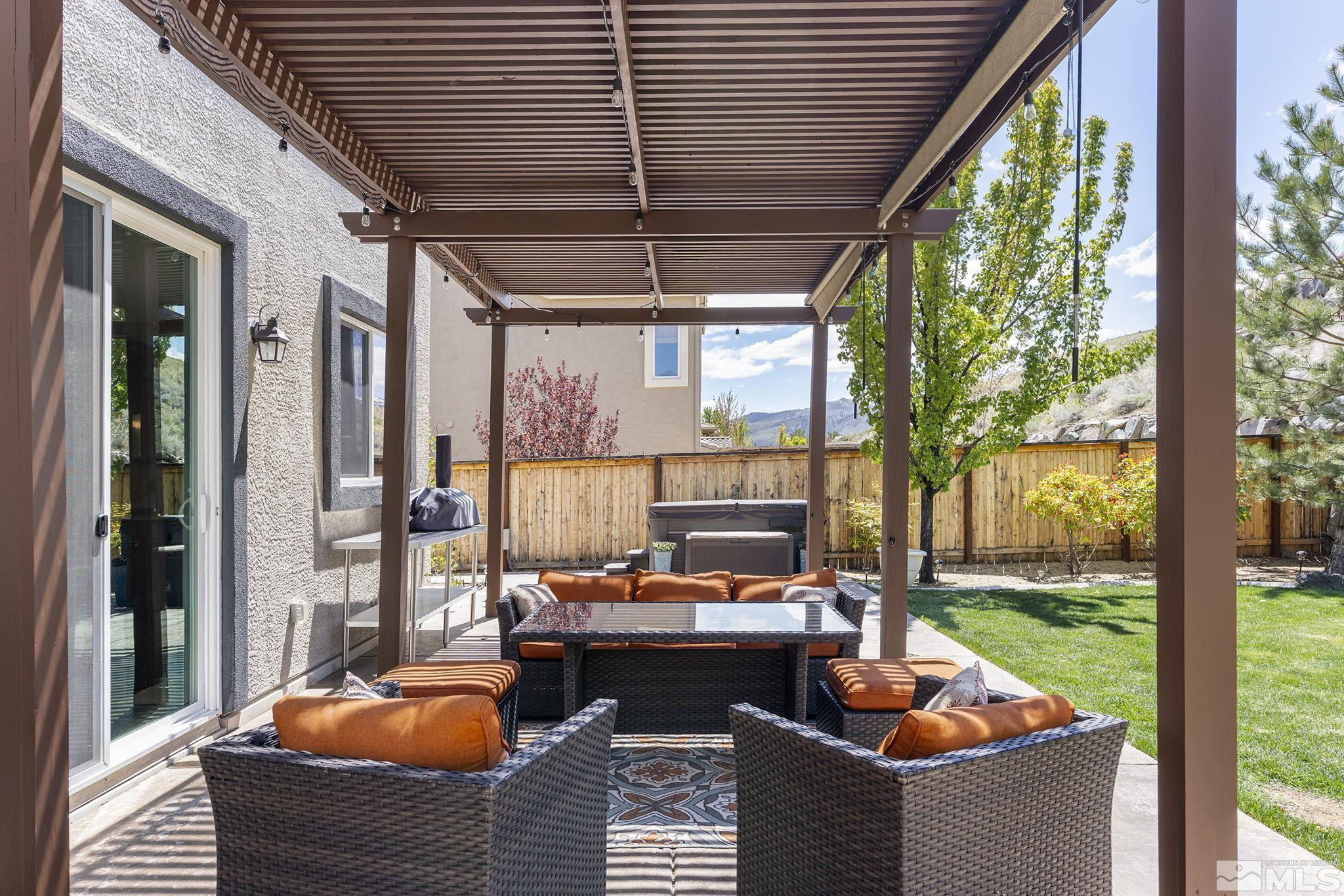 1653 Crescent Pointe Court Reno, NV 89523 - Photo 29 of 39 a outdoor space with patio the couches and pool
