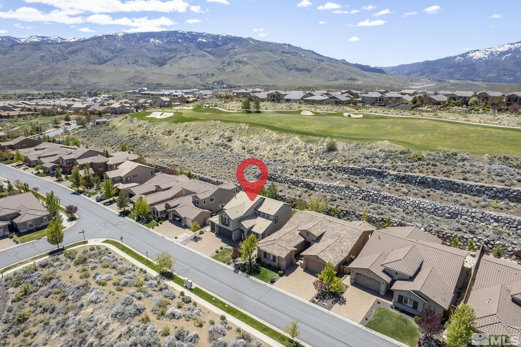 1653 Crescent Pointe Court Reno, NV 89523 - Photo 35 of 39 an aerial view of residential houses with outdoor space