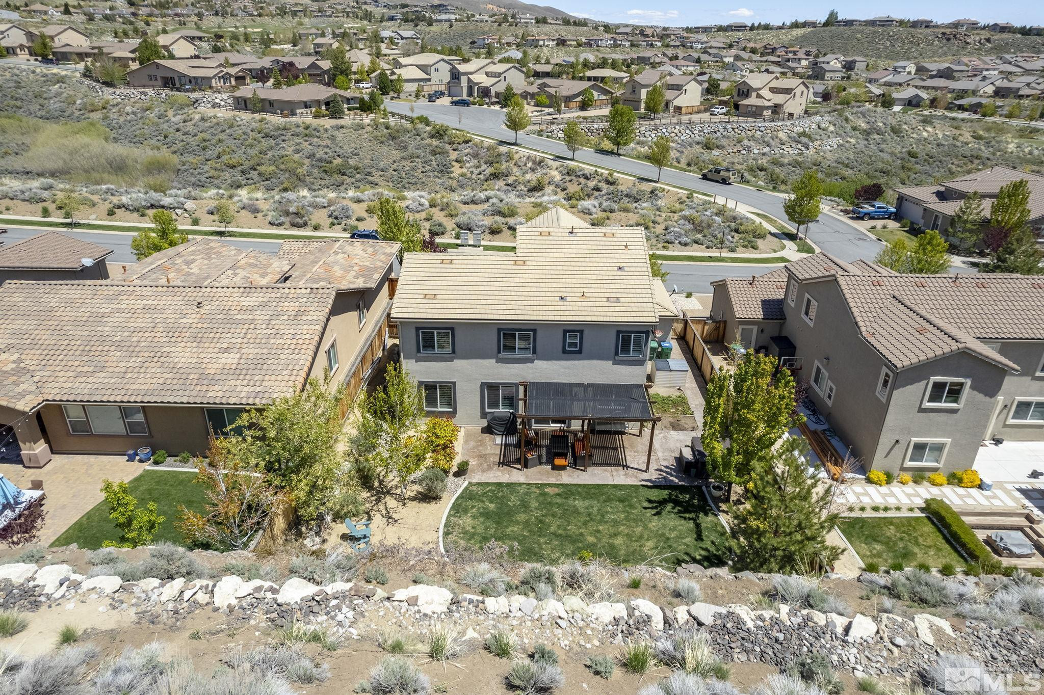 1653 Crescent Pointe Court Reno, NV 89523 - Photo 36 of 39 an aerial view of a house with a yard basket ball court and outdoor seating