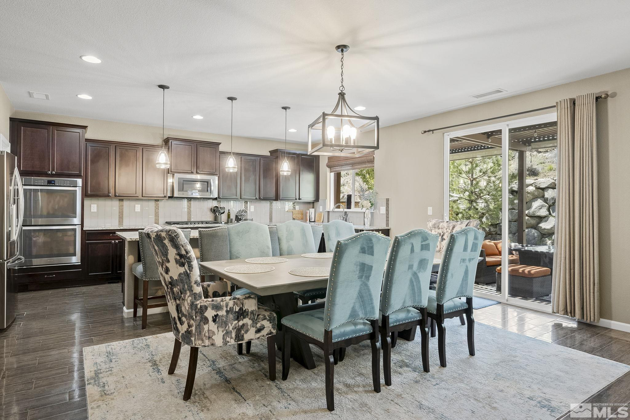 1653 Crescent Pointe Court Reno, NV 89523 - Photo 9 of 39 a view of a dining room with furniture