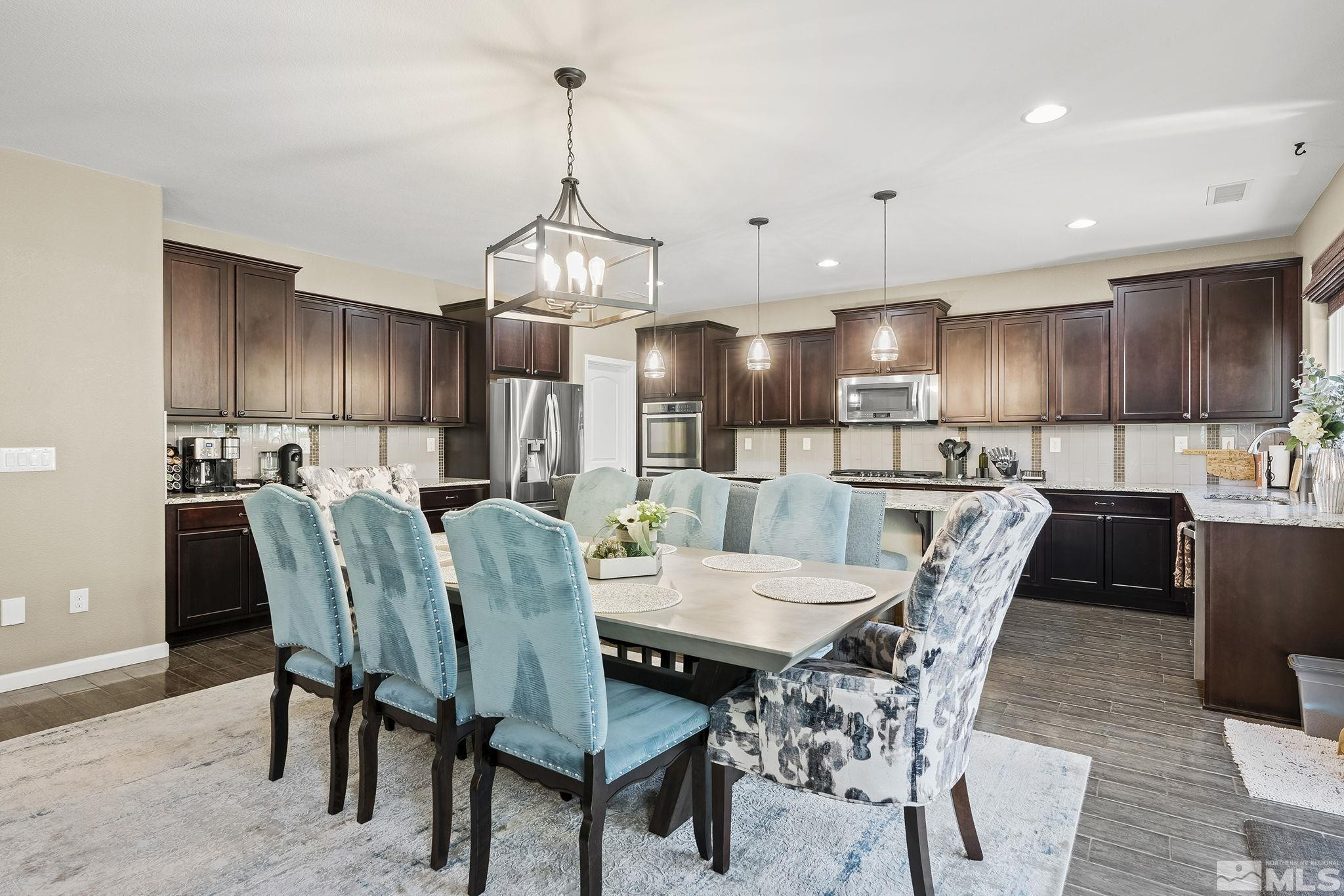 1653 Crescent Pointe Court Reno, NV 89523 - Photo 10 of 39 a view of a dining room with furniture