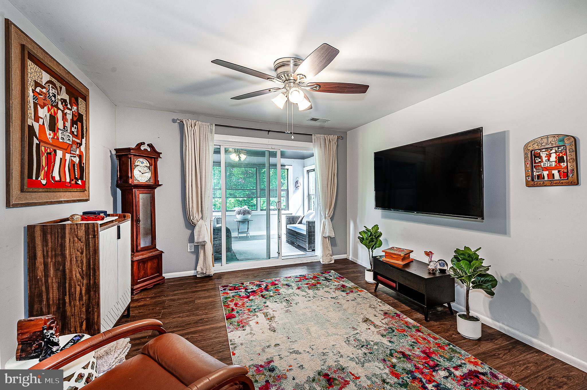 102 Brookdale Place Clementon, NJ 08021 - Photo 12 of 25 a living room with furniture and a flat screen tv