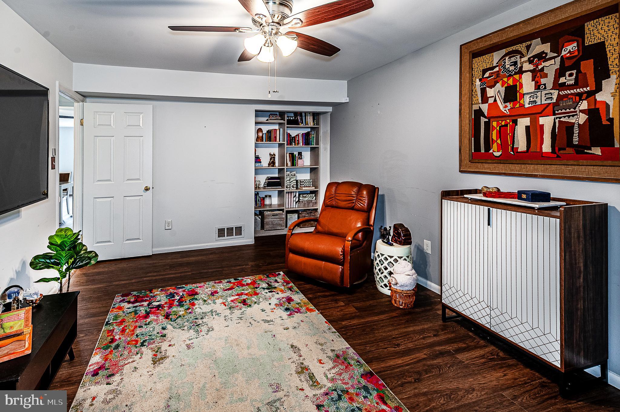 102 Brookdale Place Clementon, NJ 08021 - Photo 13 of 25 a room with furniture and wooden floor