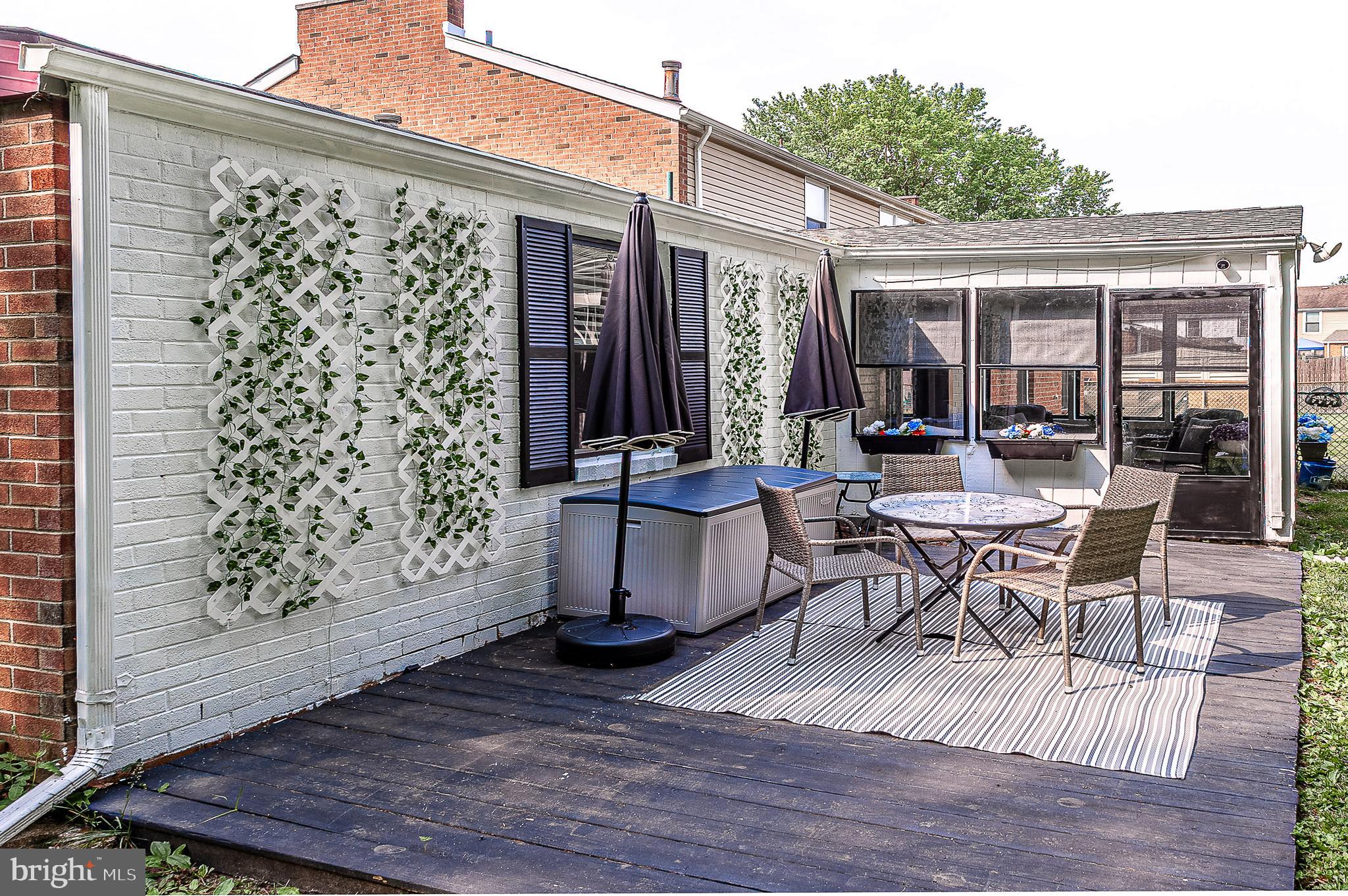 102 Brookdale Place Clementon, NJ 08021 - Photo 17 of 25 a view of a patio with table and chairs