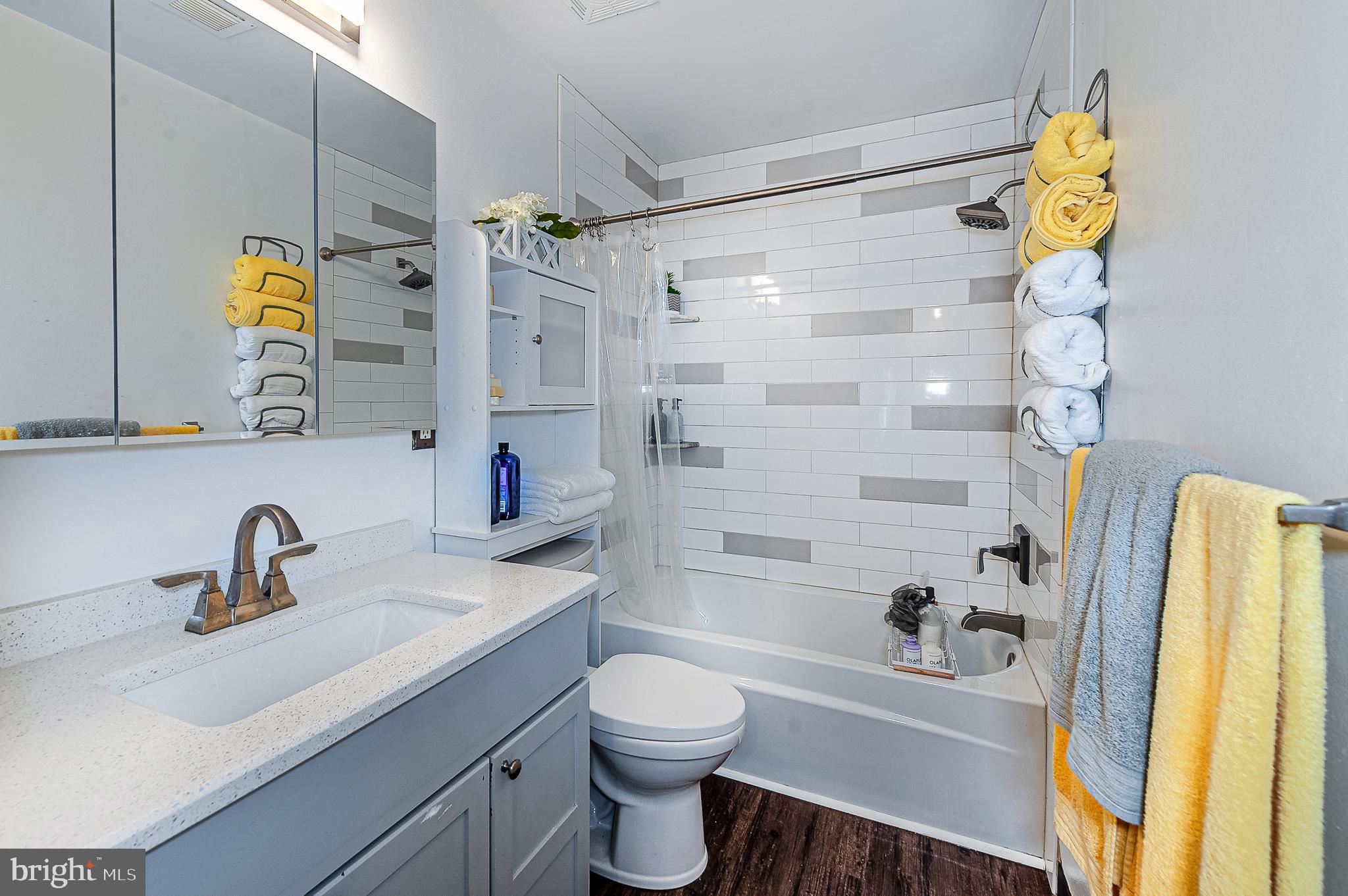 102 Brookdale Place Clementon, NJ 08021 - Photo 19 of 25 a bathroom with a sink mirror vanity and toilet