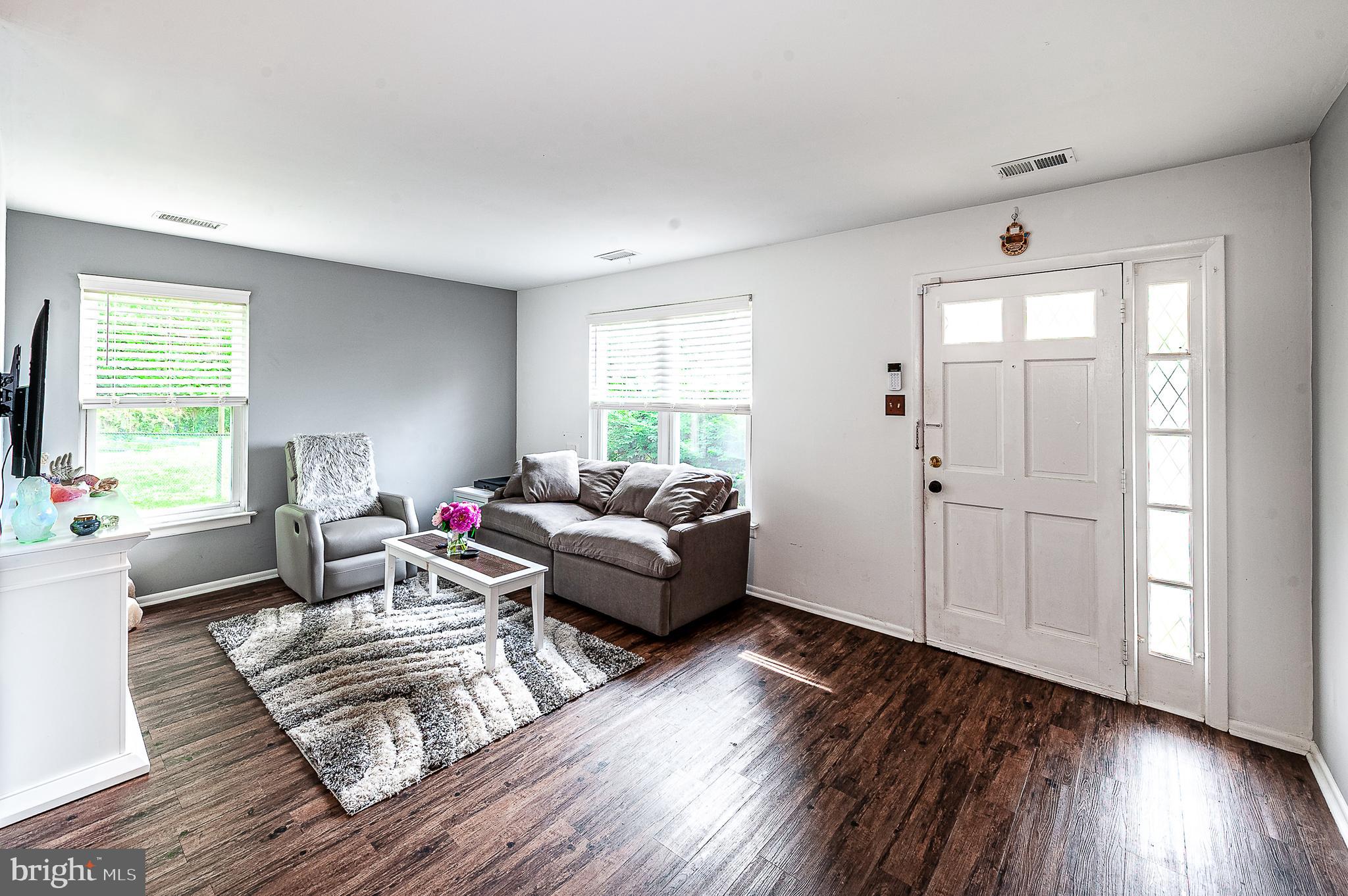 102 Brookdale Place Clementon, NJ 08021 - Photo 3 of 25 a living room with furniture and wooden floor
