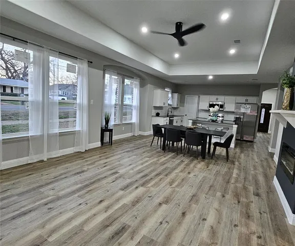 a view of a kitchen and dining room