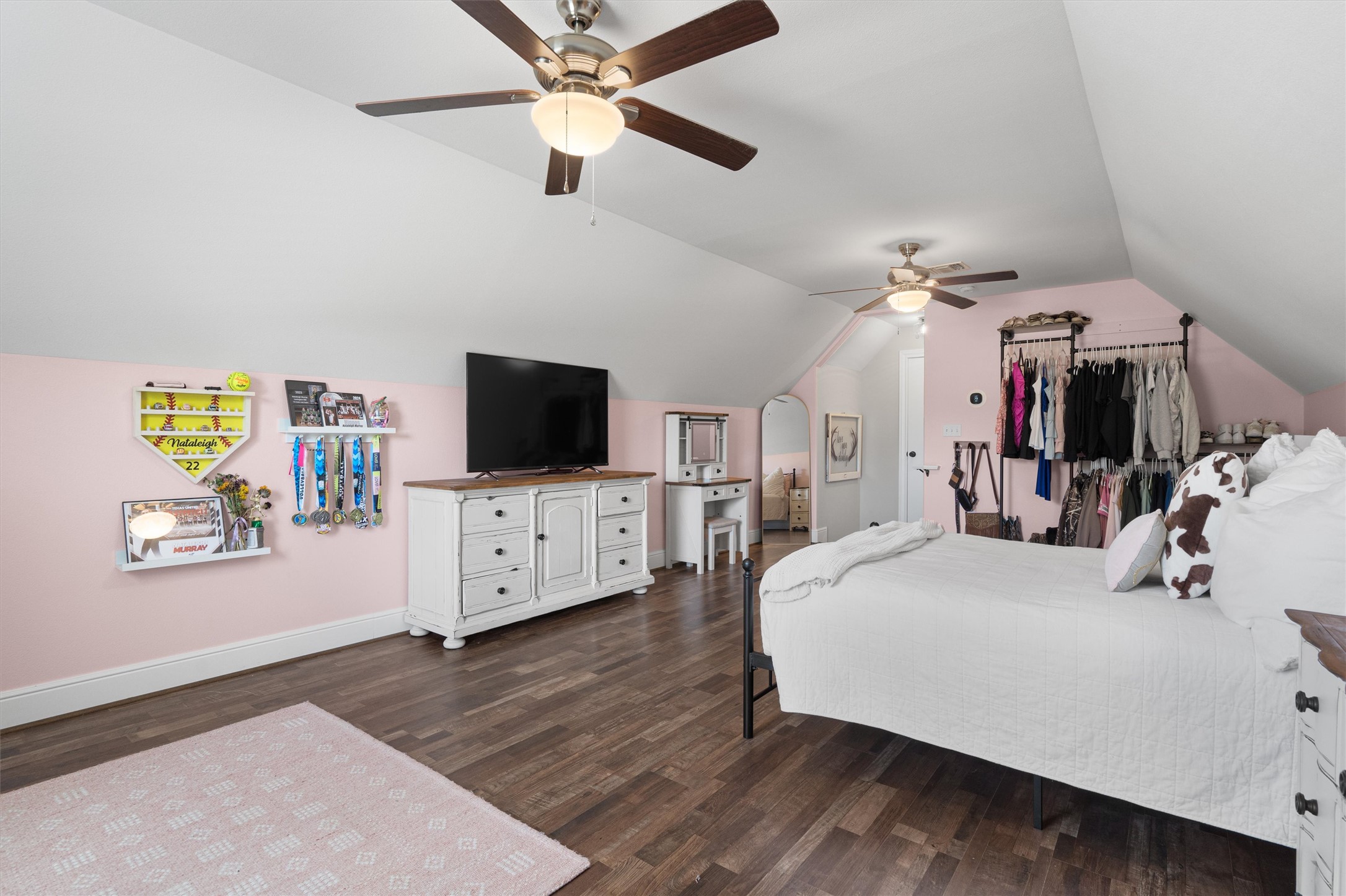 136 Fawn Hollow Elgin, TX 78621 - Photo 32 of 40 Room featuring vaulted ceilings and two ceiling fans with integrated lighting