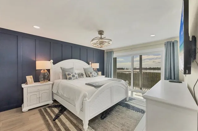 a bed room with a bed and a window