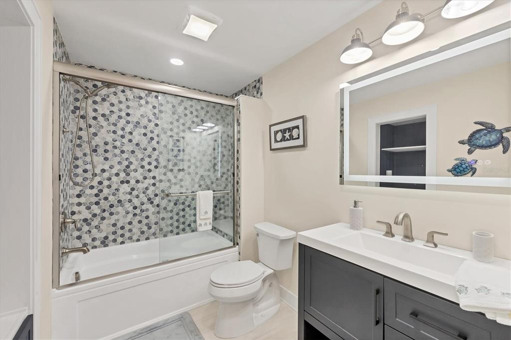 6000 Boca Grande Causeway, Unit D47 Boca Grande, FL 33921 - Photo 18 of 22 a bathroom with a sink a toilet and shower