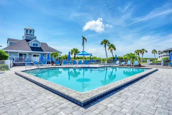 swimming pool view with sitting space and seating space