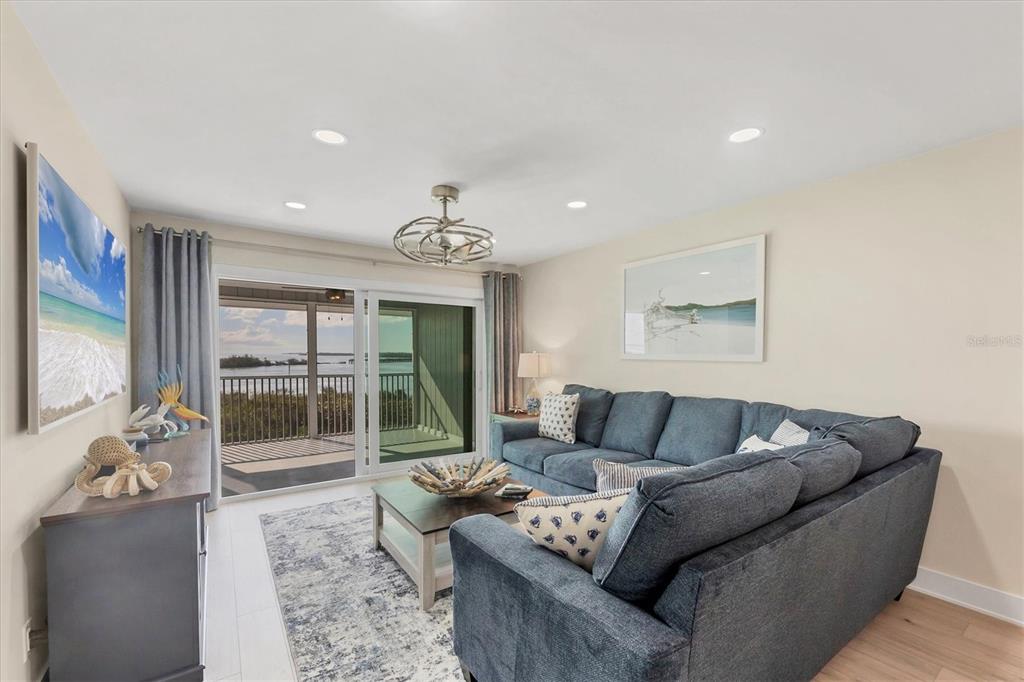 6000 Boca Grande Causeway, Unit D47 Boca Grande, FL 33921 - Photo 9 of 22 a living room with furniture and a flat screen tv