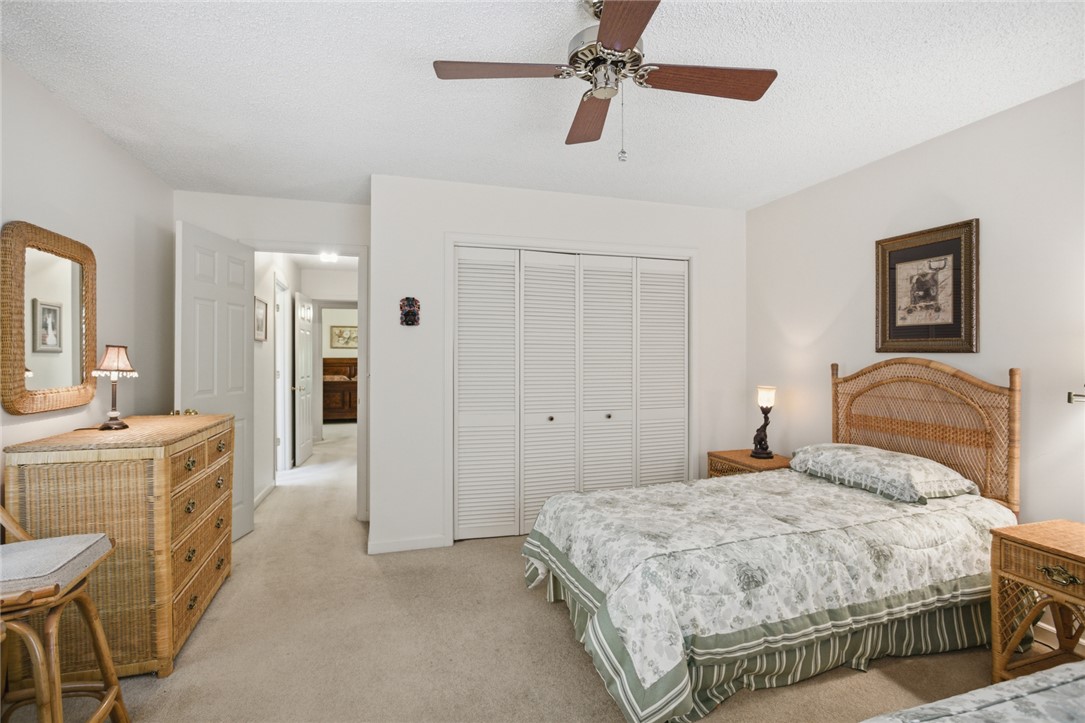 6 Tradewinds Way Salem, SC 29676 - Photo 16 of 50 This spacious bedroom offers ample storage, soft carpet flooring, and a ceiling fan for comfort.