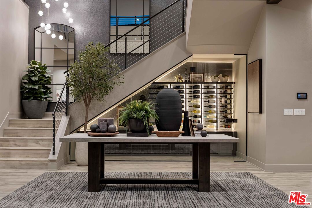 20524 Shelley Lane Porter Ranch, CA 91326 - Photo 11 of 73 a view of entryway and hall with wooden floor
