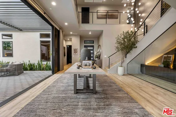 a kitchen with a table and chairs in it