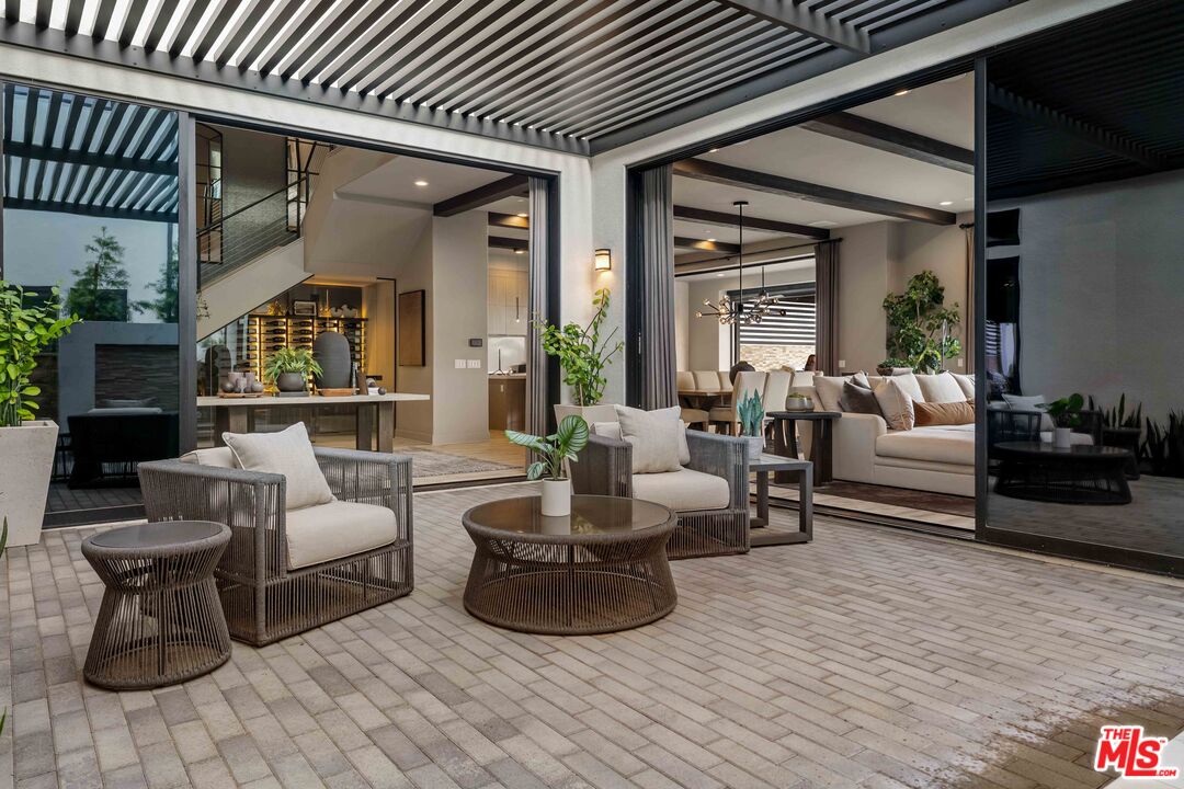 20524 Shelley Lane Porter Ranch, CA 91326 - Photo 14 of 73 a living room with furniture and a wooden floor