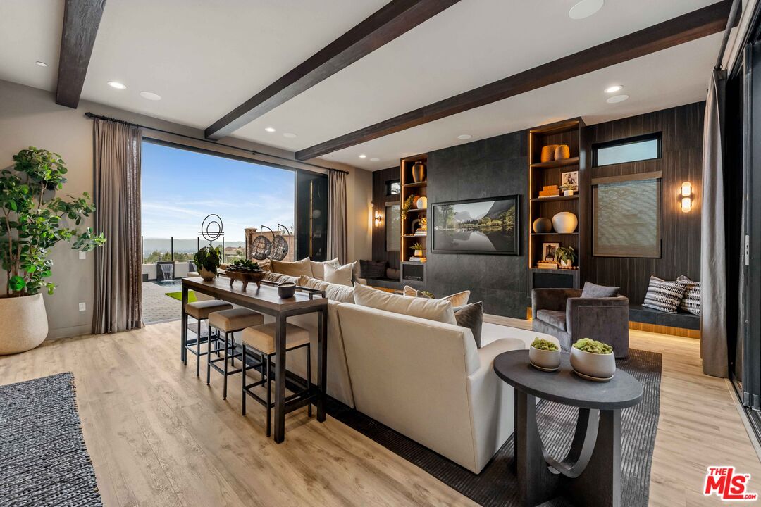 20524 Shelley Lane Porter Ranch, CA 91326 - Photo 18 of 73 a kitchen with a table and chairs in it