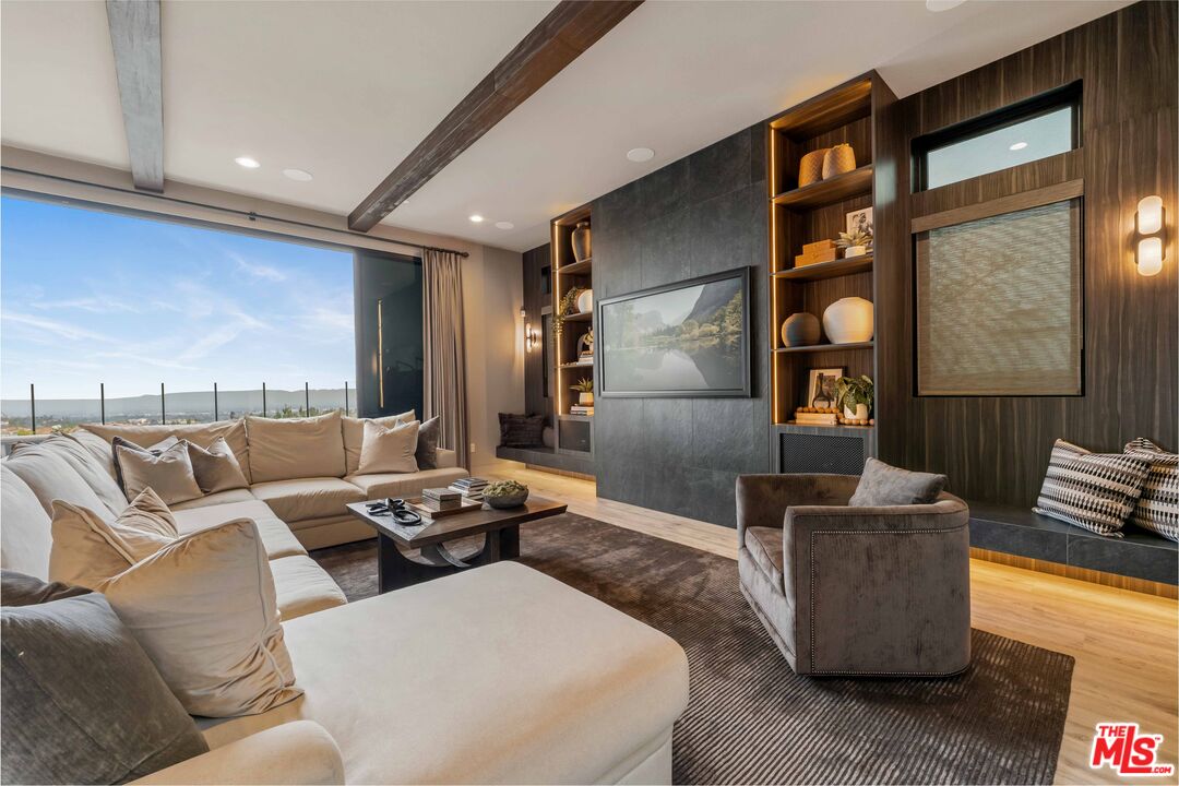 20524 Shelley Lane Porter Ranch, CA 91326 - Photo 19 of 73 a living room with furniture and a large window