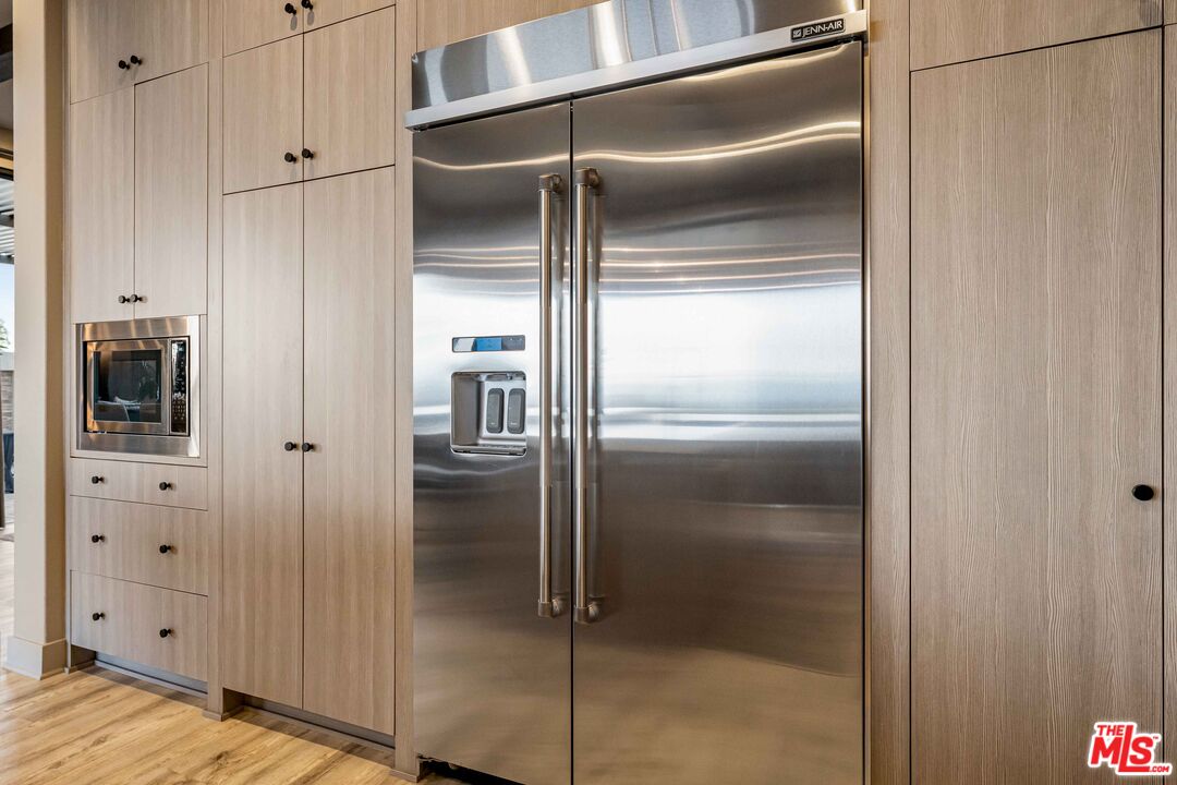 20524 Shelley Lane Porter Ranch, CA 91326 - Photo 23 of 73 a bathroom with a glass shower door