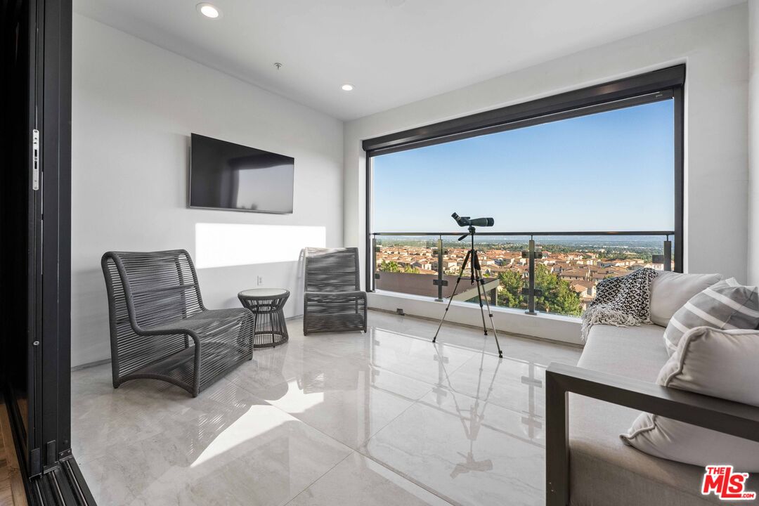 20524 Shelley Lane Porter Ranch, CA 91326 - Photo 45 of 73 a living room with furniture
