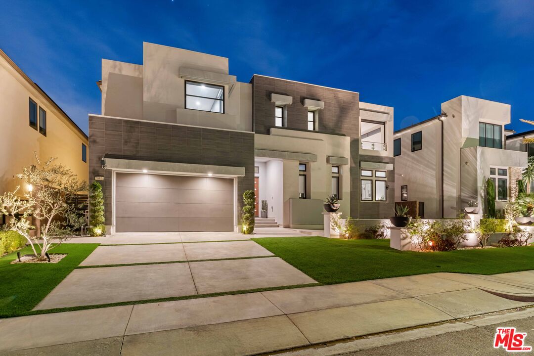 20524 Shelley Lane Porter Ranch, CA 91326 - Photo 61 of 73 a front view of a building with garden