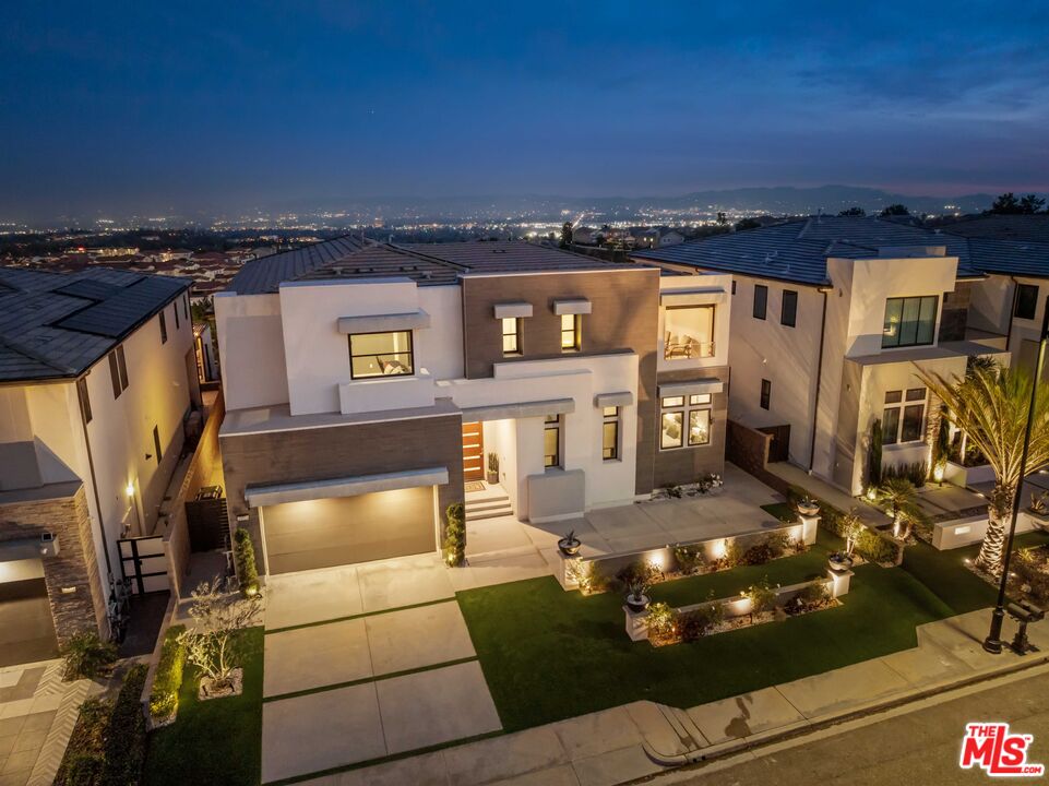 20524 Shelley Lane Porter Ranch, CA 91326 - Photo 63 of 73 a view of a terrace with chairs